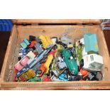 A collection of Corgi, Dinky, Tri-ang Minic and other model vehicles and toys, in a small trunk
