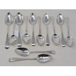 A set of twelve silver old English pattern dessertspoons, some initialled, various dates and makers,