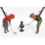 A 1920's Schoenhut's Indoor Golf game, comprising a pair of articulated trigger controlled