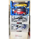 A UT Models 1:18 die-cast model Ford Escort Cosworth, and four others, all boxed (5)