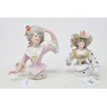 A porcelain half doll, probably Galluba & Hoffman, lady with grey hair and a pink dress with white