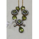 A Victorian style necklace, set seed pearls, peridots and diamonds