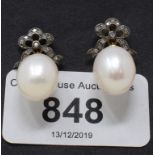 A pair of white pearl drop earrings, with diamond bow tops, boxed