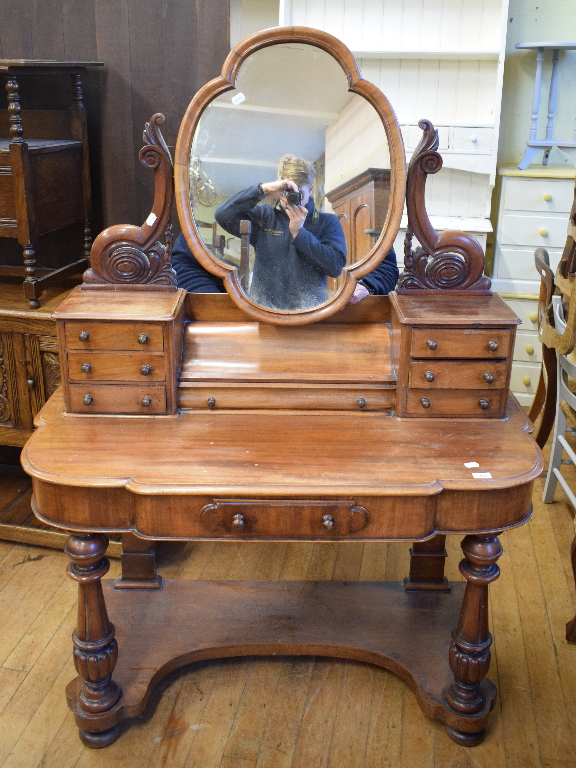 A Victorian mahogany duchess dressing table, 122 cm wide, a Titchmarsh & Goodwin oak dresser, an oak