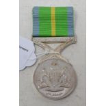 A Malaysian General Service Medal Pingat Khidmat Berbakti Medal, unnamed, and a box Report by Rb Not