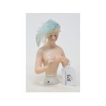 A Goebel porcelain half doll, nude lady round a real fabric cloche with feathers, impressed marks to