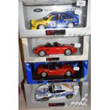 A UT Models 1:18 die-cast model Ford Escort RS Cosworth, and three others, all boxed (4)