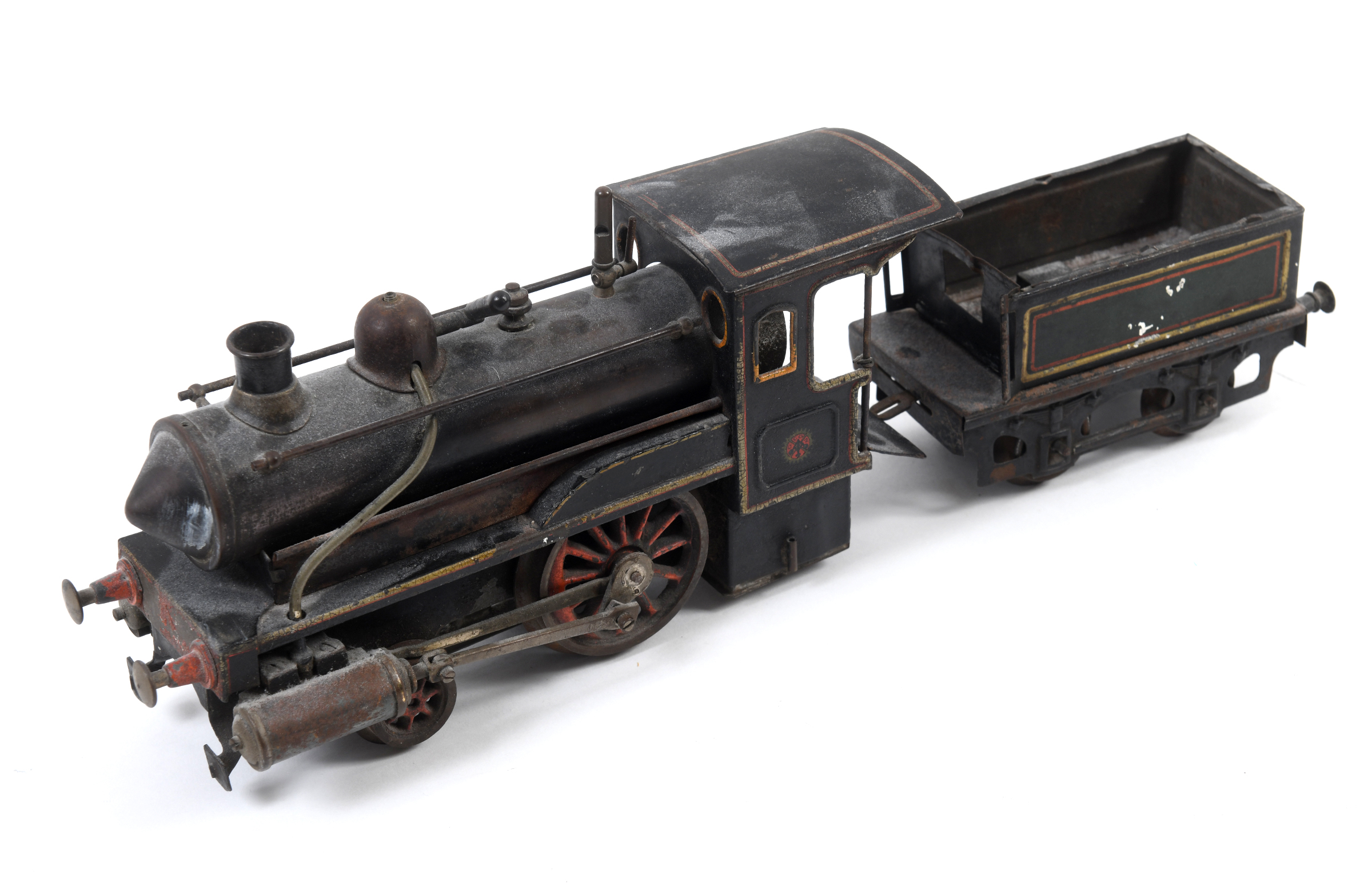 A Carette 0 gauge live steam locomotive and tender, 0-4-0 See illustration