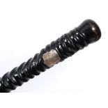 An historically interesting walking cane, having a natural oryx horn shaft and a carved wood