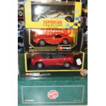 A Corgi 1:18 die-cast model MGB, and eight others, all boxed (9)