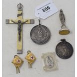 Assorted silver medallions, crucifixes, buttons and other items