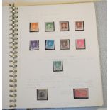 An album of world stamps, including China 1902-1953, with many annotations