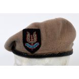A Special Air Service Regiment sand coloured beret, with a black leather trim and black ribbon