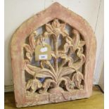 A Mughal sandstone panel, of lancet form, with floral decoration, 41 cm wide