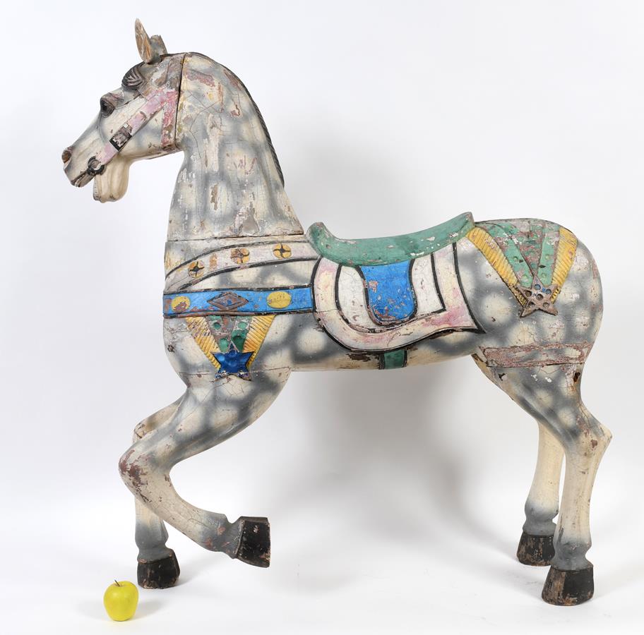 A carved and painted carousel horse, 123 cm high See illustration Report by RB Some paint loss Quite