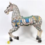 A carved and painted carousel horse, 123 cm high See illustration Report by RB Some paint loss Quite