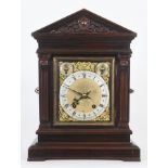 A late 19th century mantel clock, the 16 cm square brass dial signed Jameson, Dublin, with a