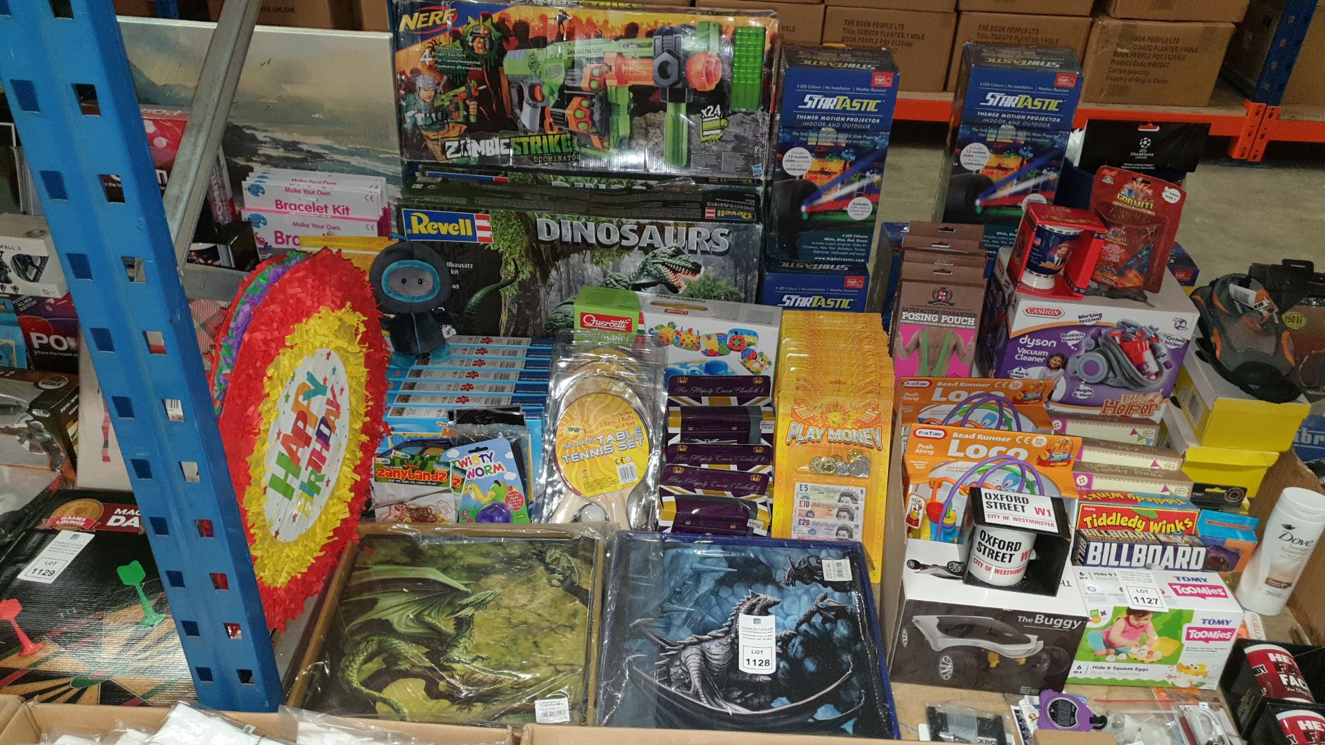 MIXED LOT CONTAINING REVELL DINOSAURS SETS, NERF ZOMBIE STRIKE, TABLE TENNIS SETS, CORGI SOUVENIER