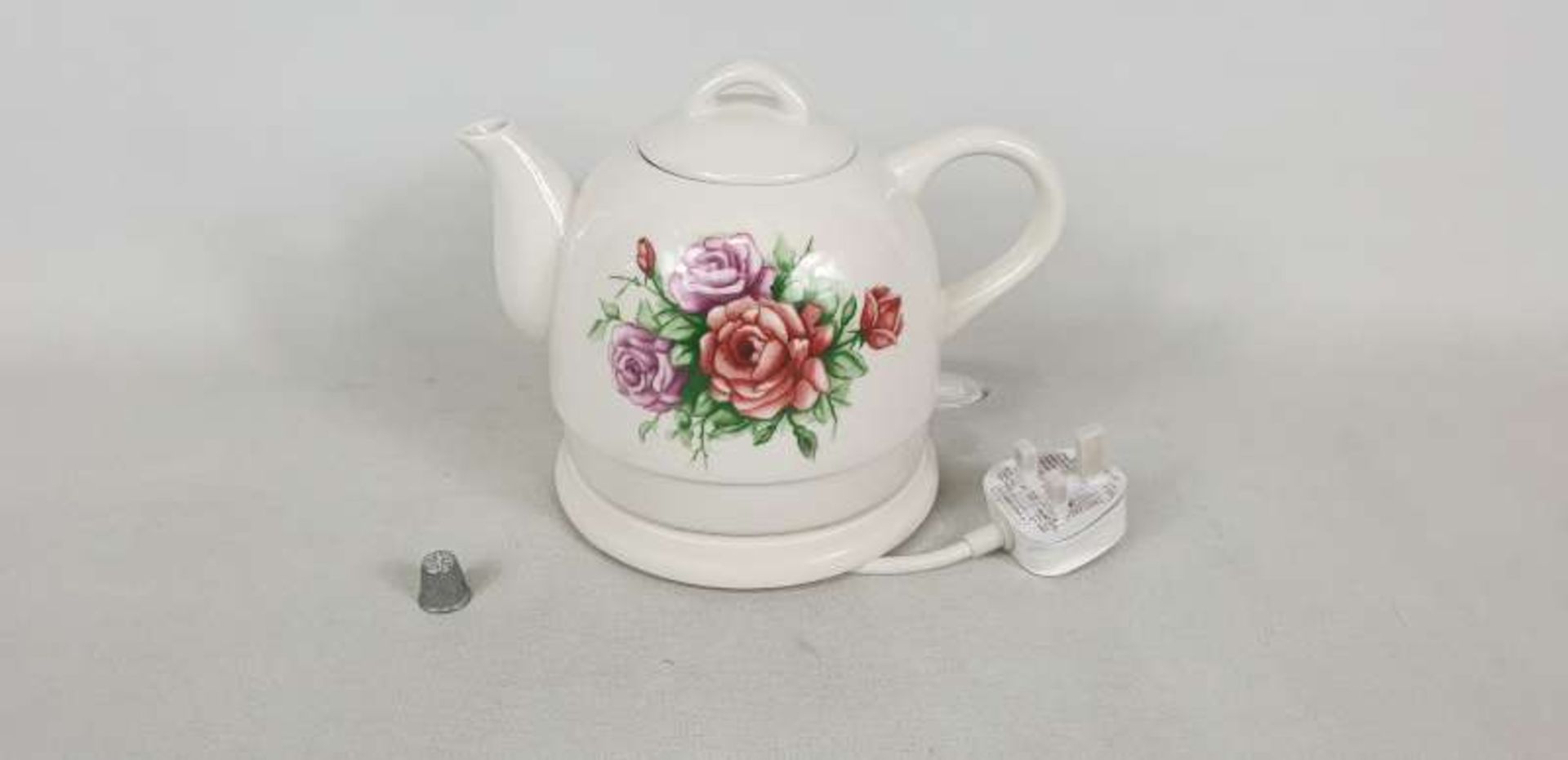 20 X BRAND NEW BOXED CERAMIC KETTLES WITH FLORAL DETAIL IN 5 BOXES