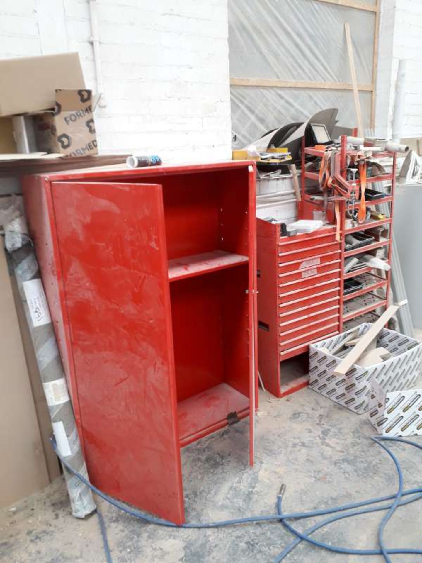 2 X RED PAINTED MULTI SHELF STANDS,AND 1 X RED PAINTED DOUBLE DOOR METAL CABINET WITH SHELF. 1 X