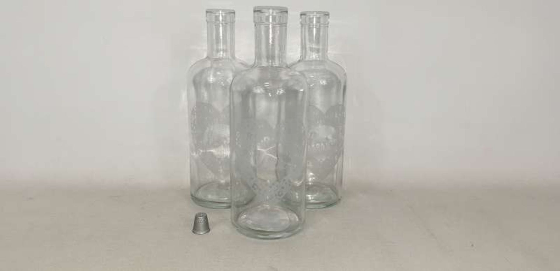 120 X GLASS BOTTLE VASES WITH LOVE HEART DETAIL IN 20 BOXES