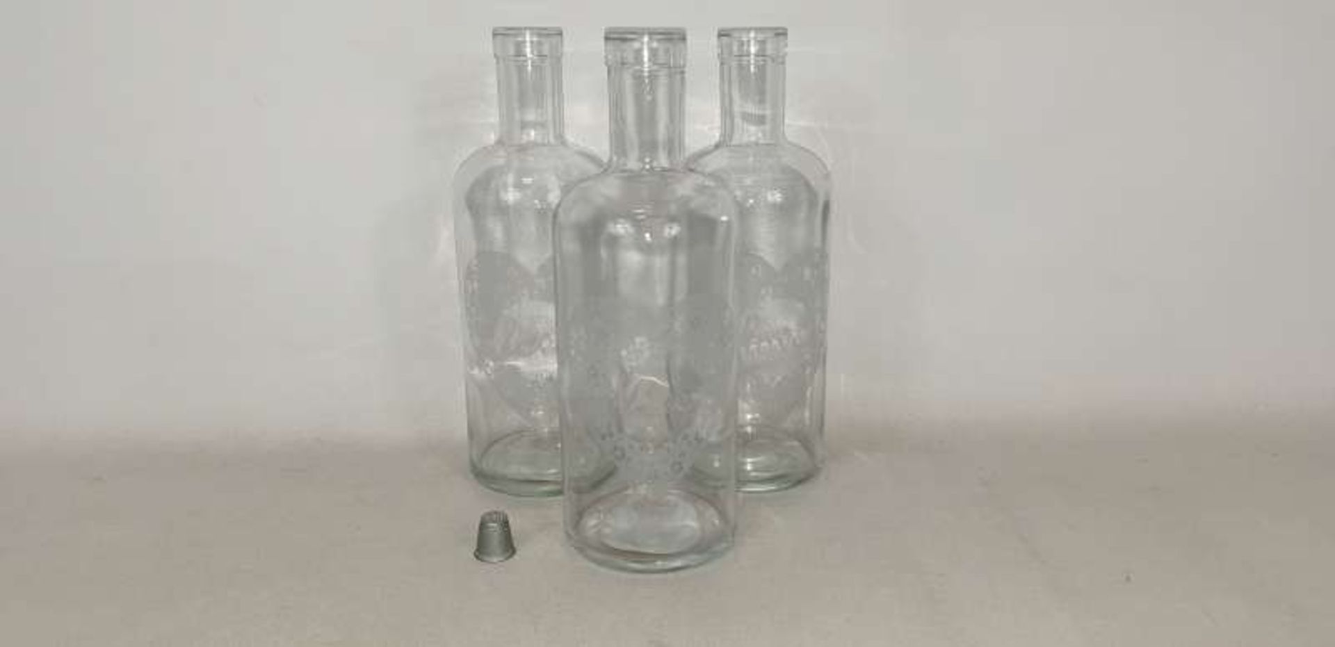 120 X GLASS BOTTLE VASES WITH LOVE HEART DETAIL IN 20 BOXES