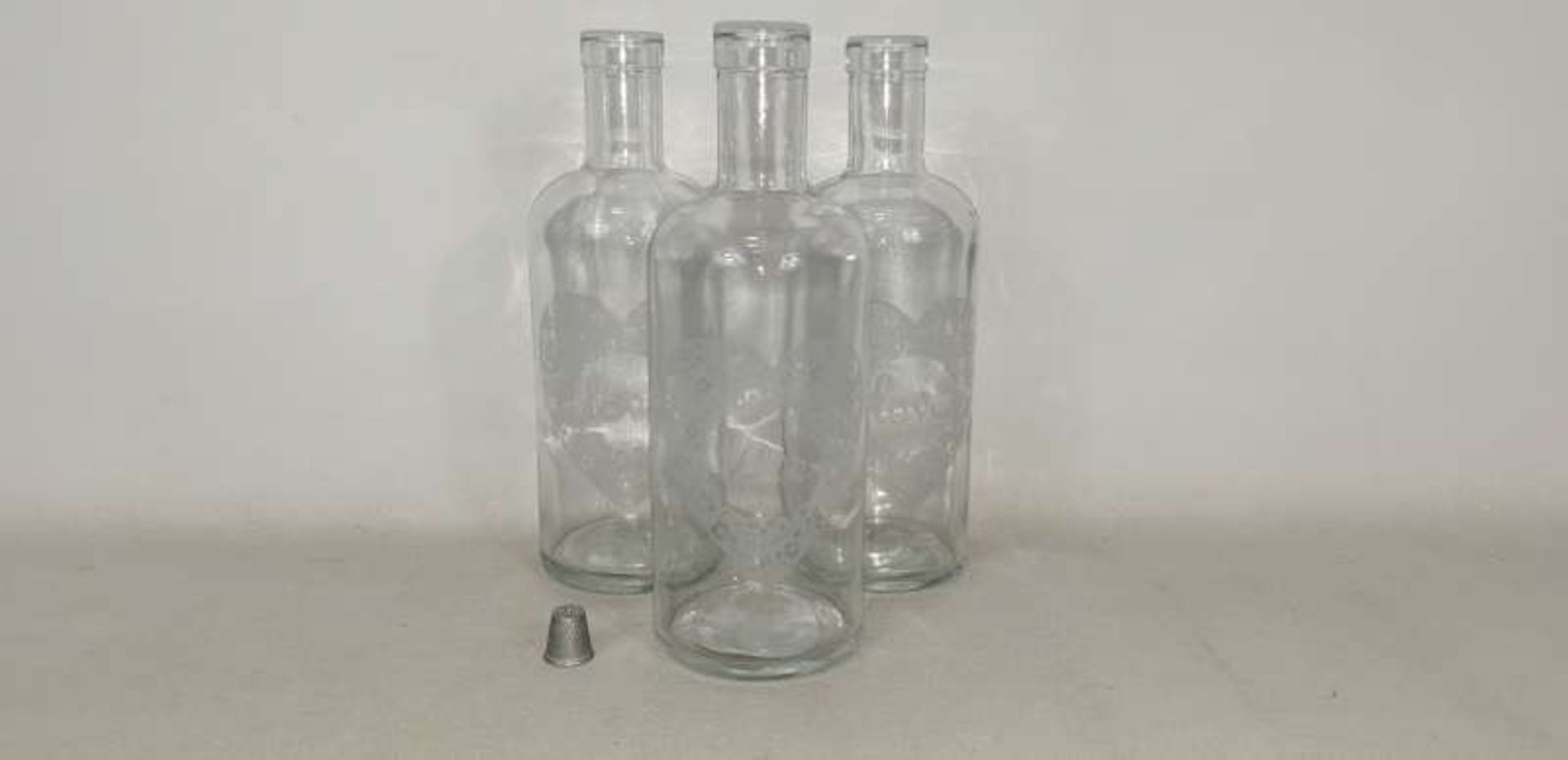 120 X GLASS BOTTLE VASES WITH LOVE HEART DETAIL IN 20 BOXES