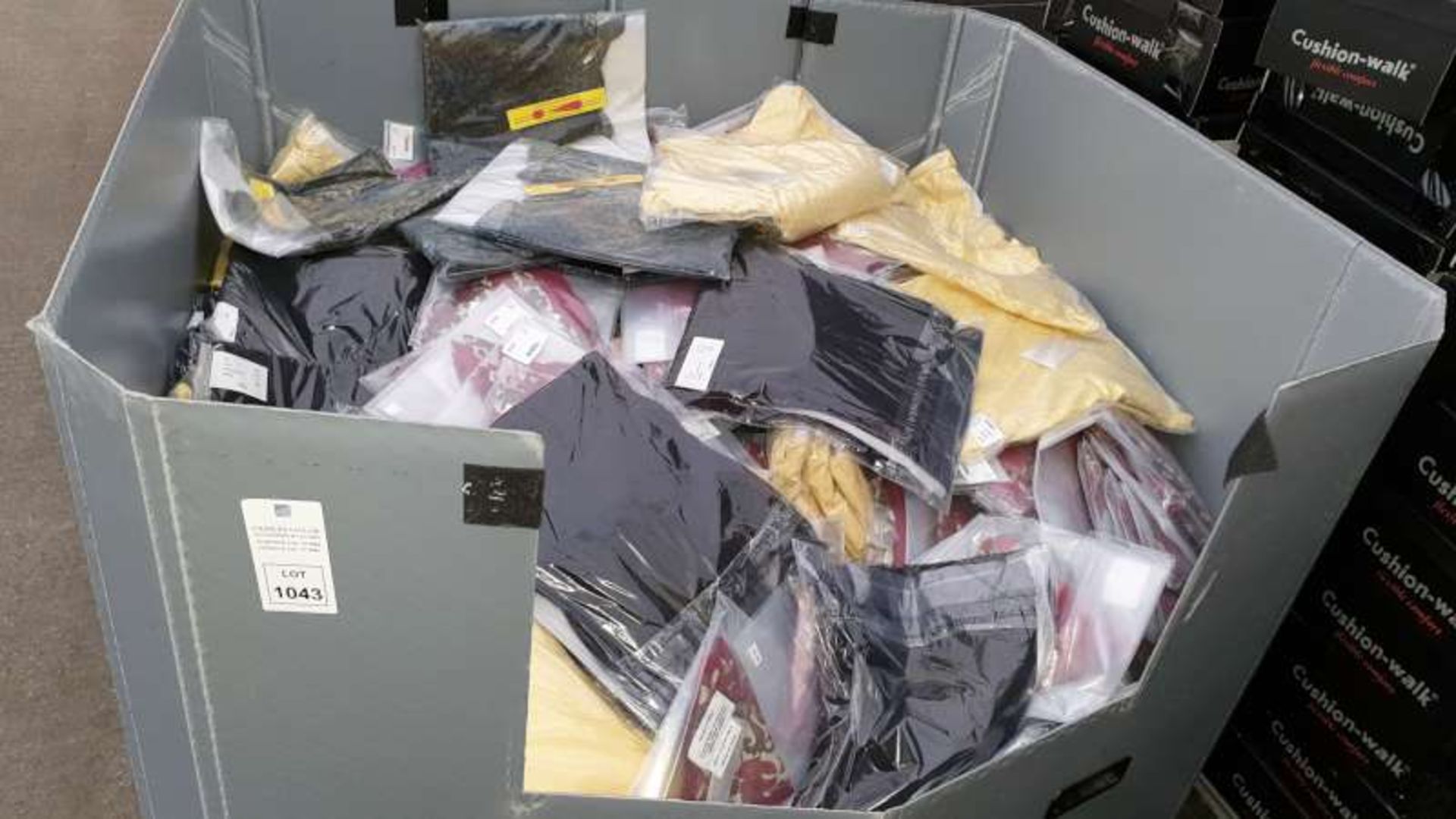 BOX PALLET CONTAINING A LARGE QTY OF CLOTHING IN VARIOUS COLURS / STYLES / SIZES