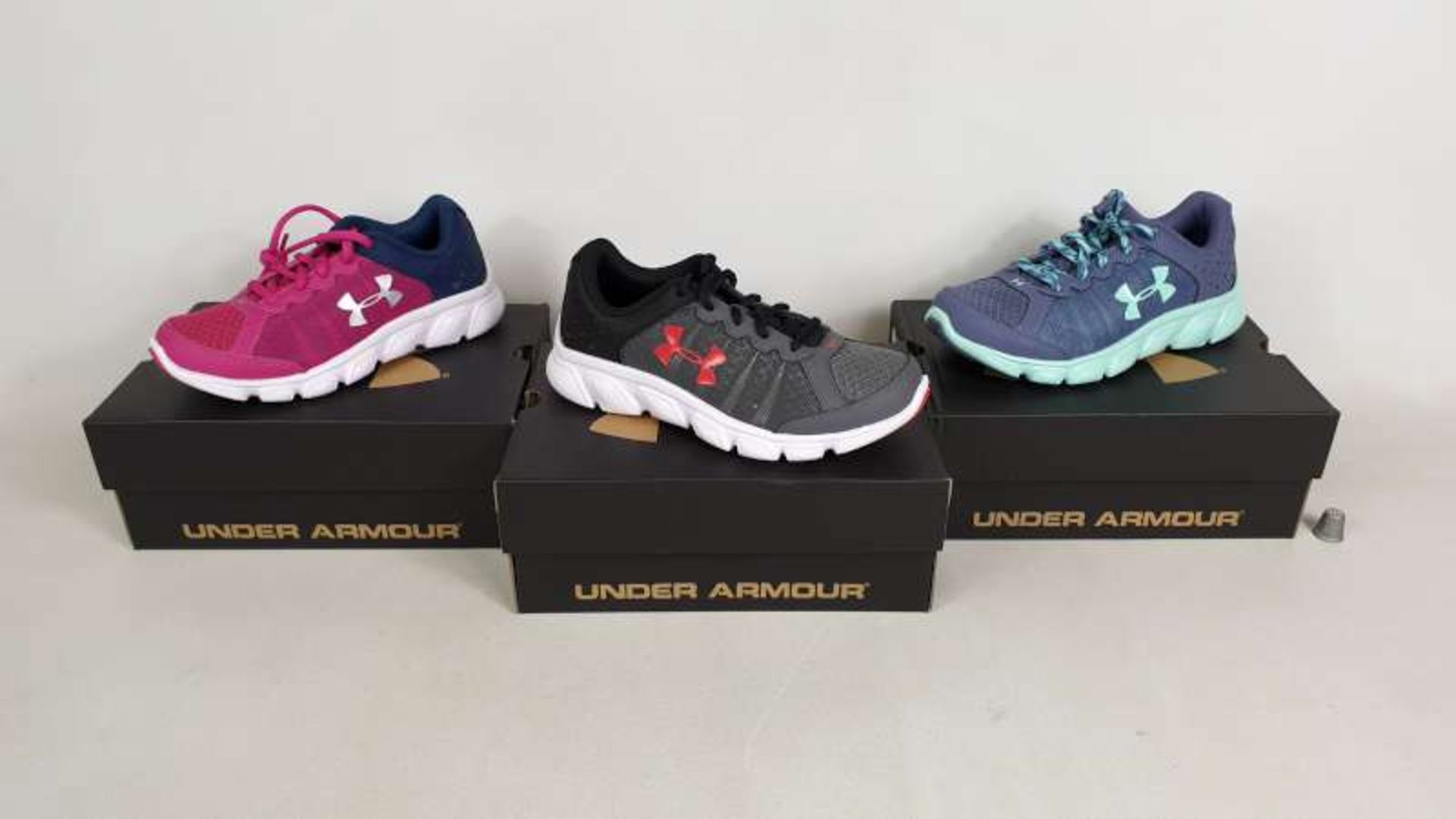 10 X BRAND NEW UNDER ARMOUR CHILDRENS TRAINERS IN VARIOUS STYLES AND SIZES