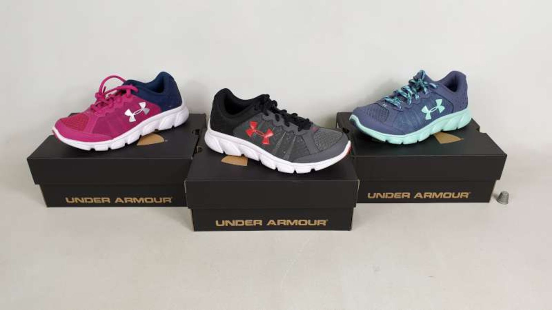 10 X BRAND NEW UNDER ARMOUR CHILDRENS TRAINERS IN VARIOUS STYLES AND SIZES