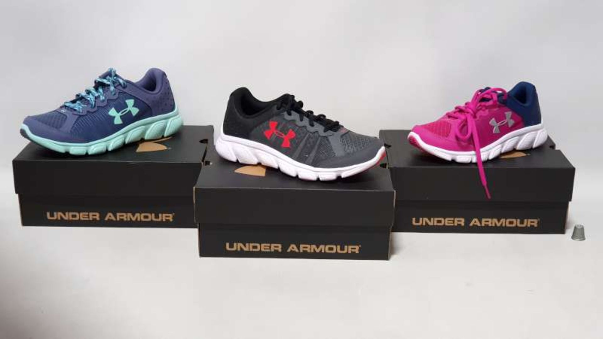 10 X BRAND NEW BOXED UNDER ARMOUR CHILDRENS TRAINERS IN VARIOUS STYLES AND SIZES