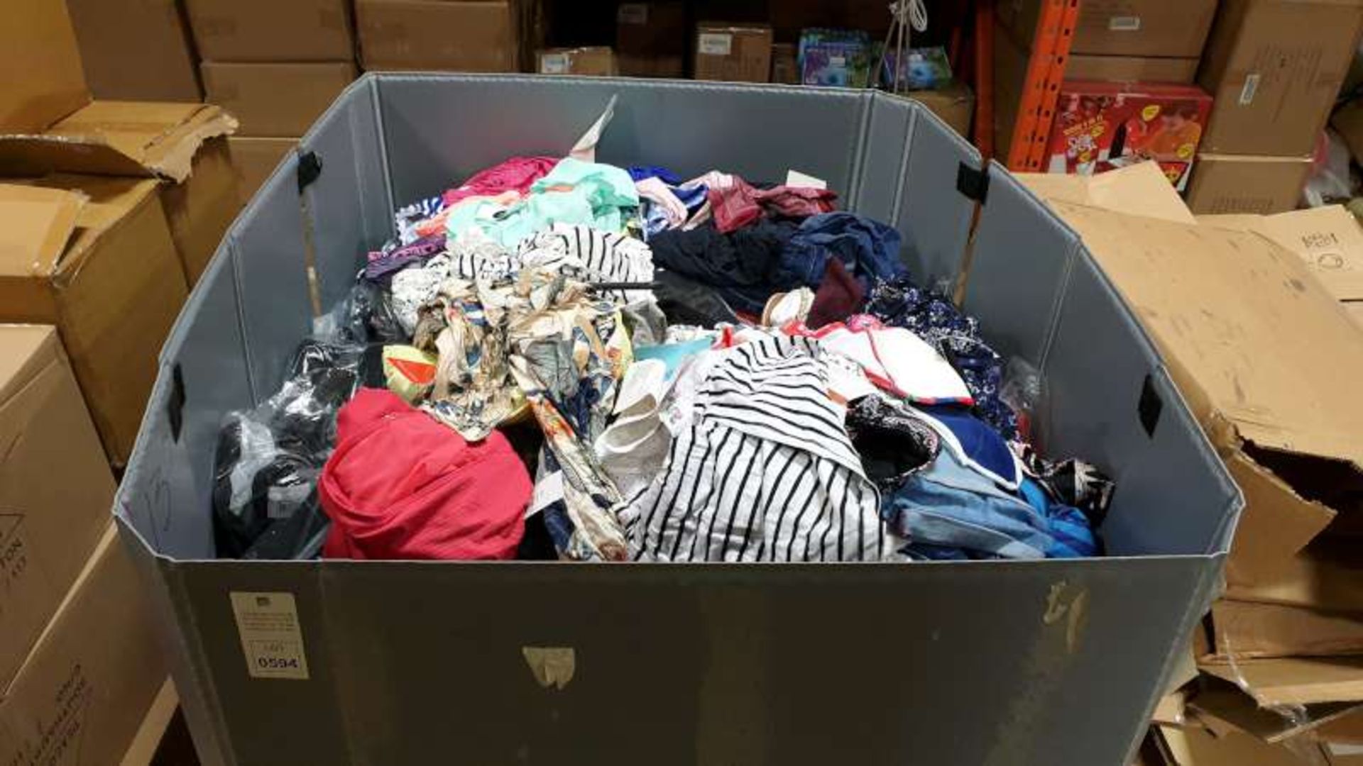 BOX PALLET CONTAINING A LARGE QUANTITY OF CLOTHING IN VARIOUS STYLES AND SIZES