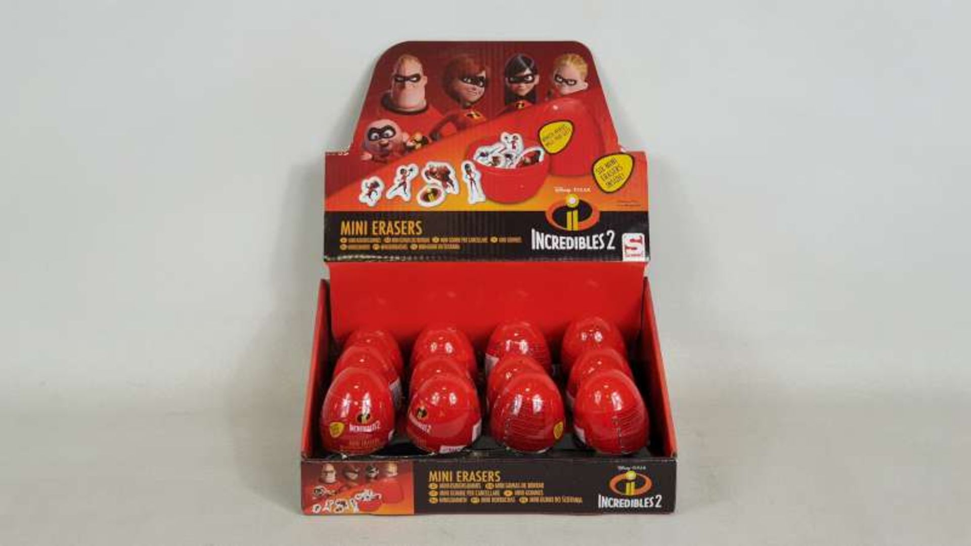 96 X BRAND NEW BOXED INCREDIBLES SECRET EGG FLAT ERASERS IN DISPLAY CASES IN 2 BOXES