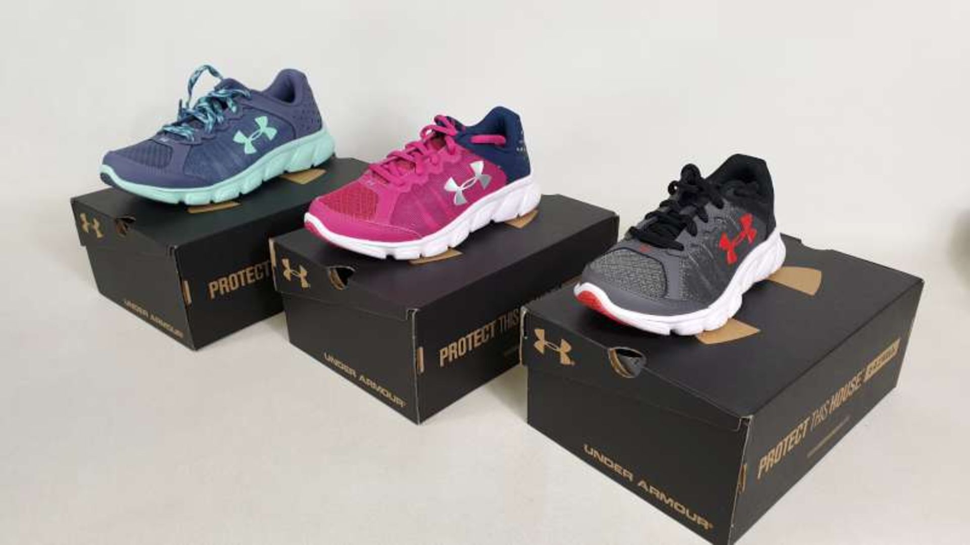 10 X BRAND NEW BOXED UNDER ARMOUR CHILDRENS TRAINERS IN VARIOUS STYLES AND SIZES