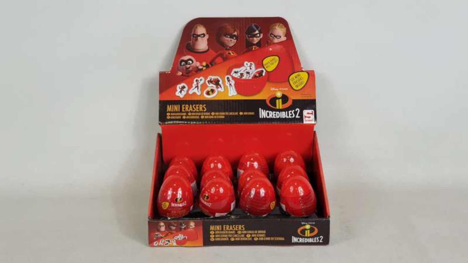 96 X BRAND NEW BOXED INCREDIBLES SECRET EGG FLAT ERASERS IN DISPLAY CASES IN 2 BOXES