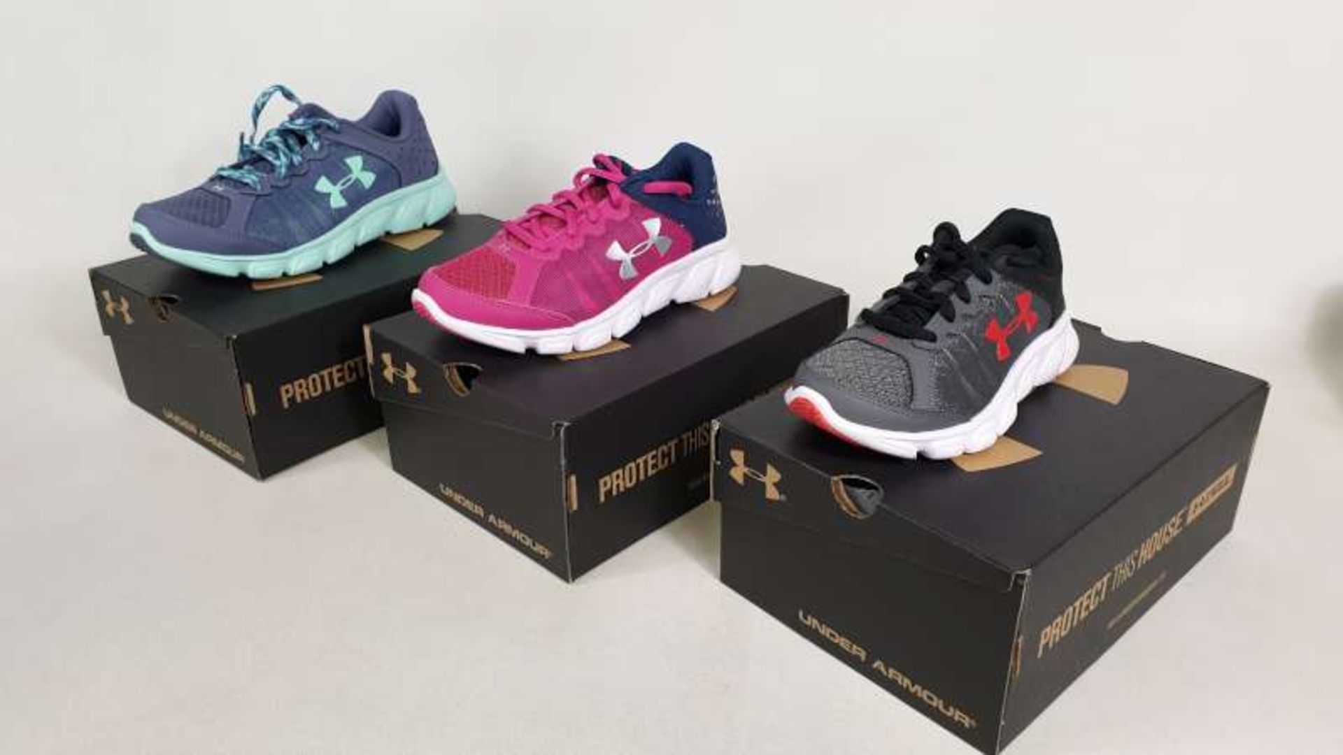10 X BRAND NEW BOXED UNDER ARMOUR CHILDRENS TRAINERS IN VARIOUS STYLES AND SIZES