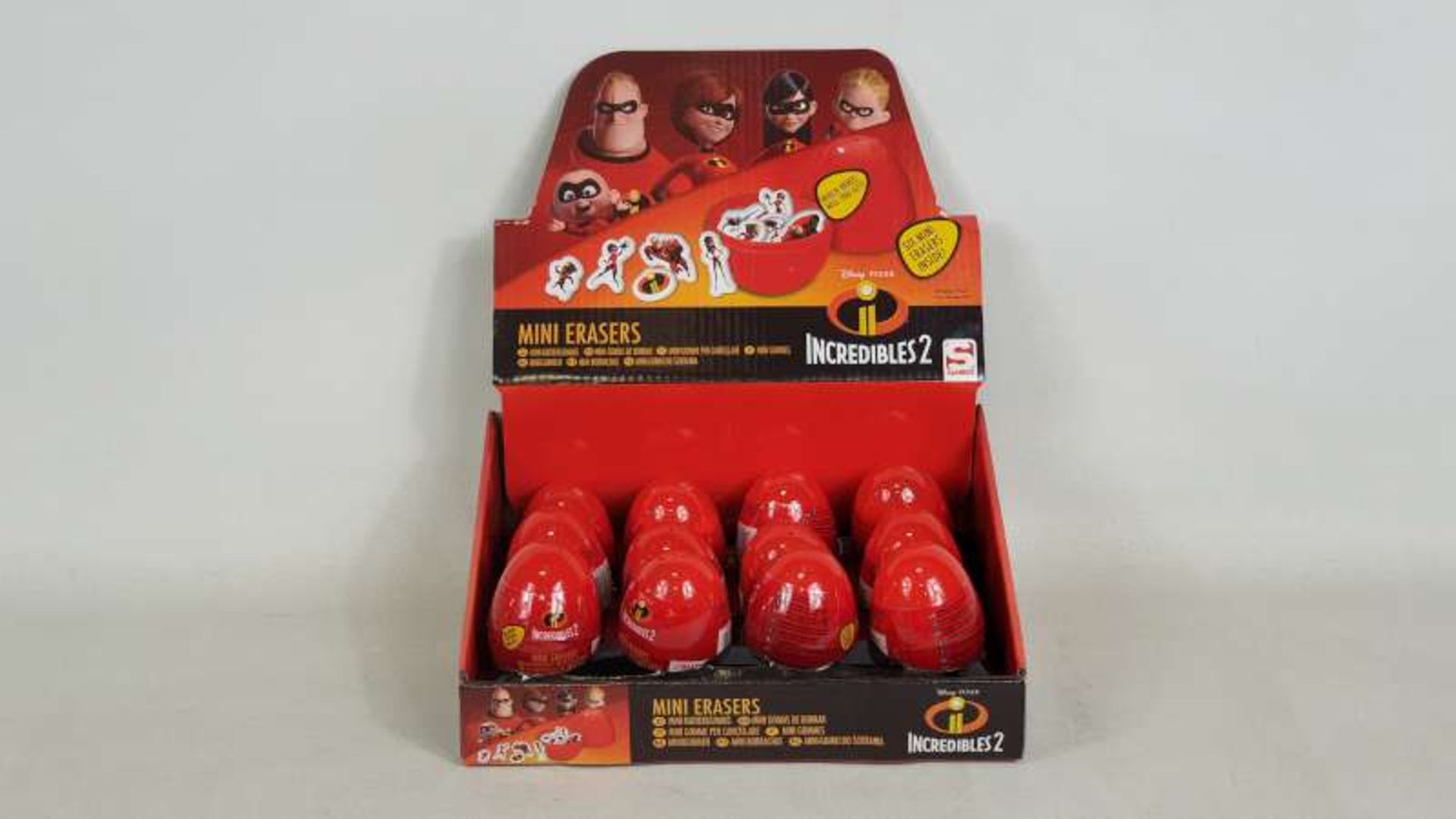 96 X BRAND NEW BOXED INCREDIBLES SECRET EGG FLAT ERASERS IN DISPLAY CASES IN 2 BOXES