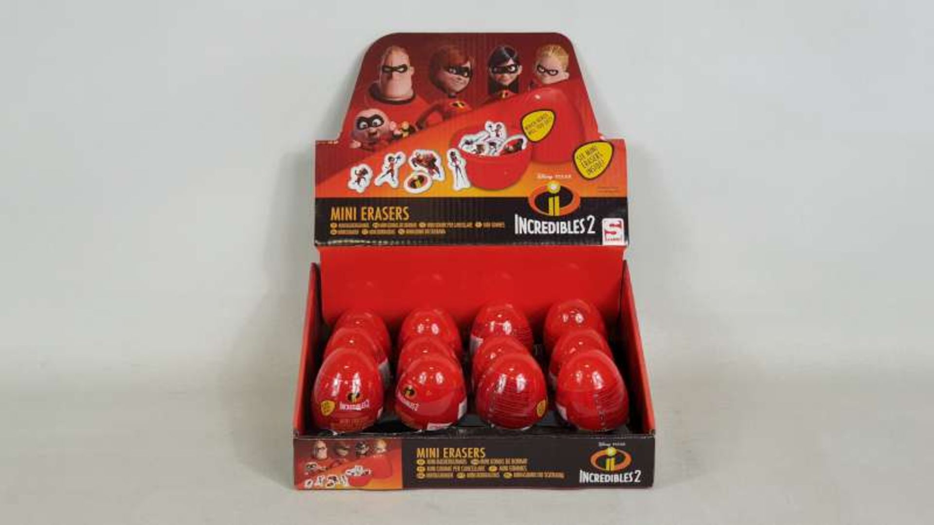 96 X BRAND NEW BOXED INCREDIBLES SECRET EGG FLAT ERASERS IN DISPLAY CASES IN 2 BOXES