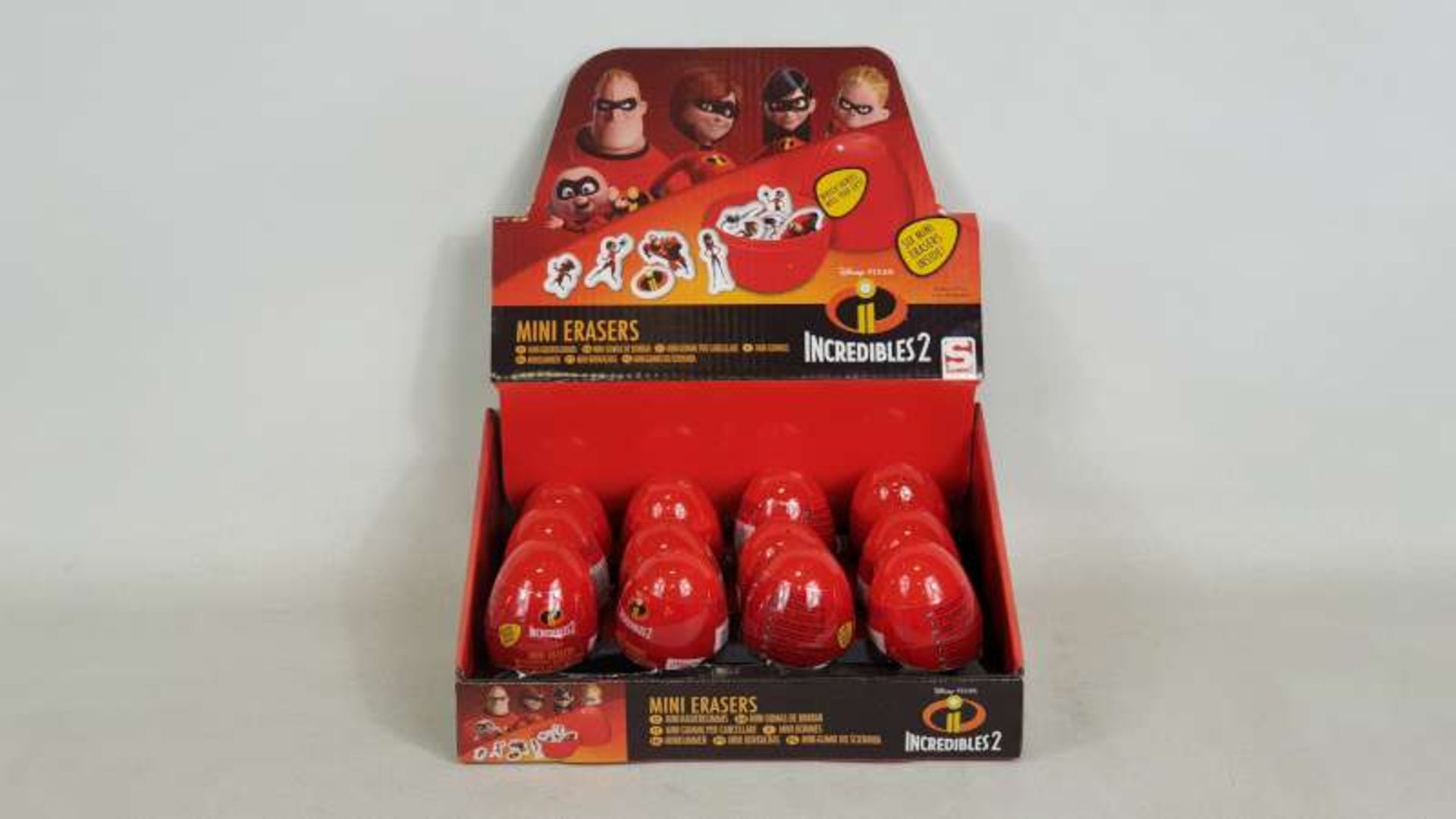 96 X BRAND NEW BOXED INCREDIBLES SECRET EGG FLAT ERASERS IN DISPLAY CASES IN 2 BOXES