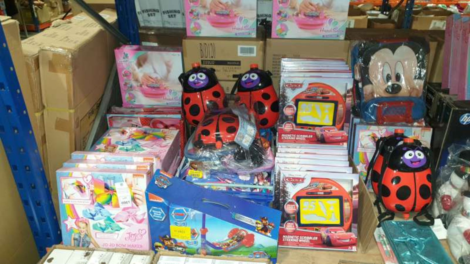 MIXED LOT CONTAINING PAW PATROL SCOOTER, DISNEY CARS MAGNETIC SCRIBBLER WHEELS, JO JO BOW MAKER
