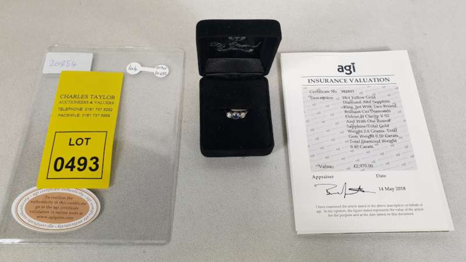 0.9CT H VS2 DIAMOND AND SAPPHIRE RING SET IN 18CT YELLOW GOLD WITH CERTIFICATION REF AGI/981803