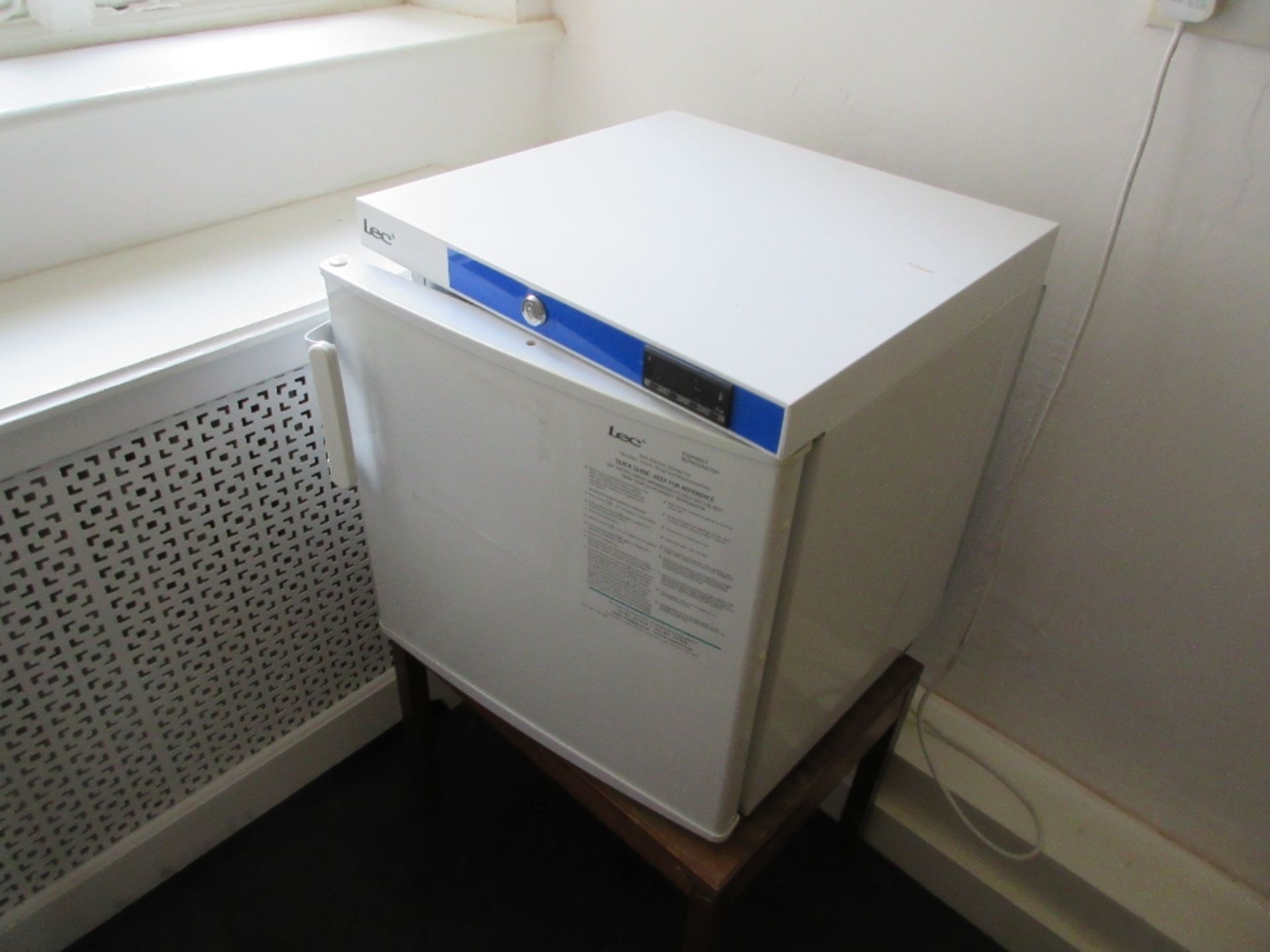 Contents of Treatment Room to include: small LEC fridge, stool, small plastic filing drawers, 2