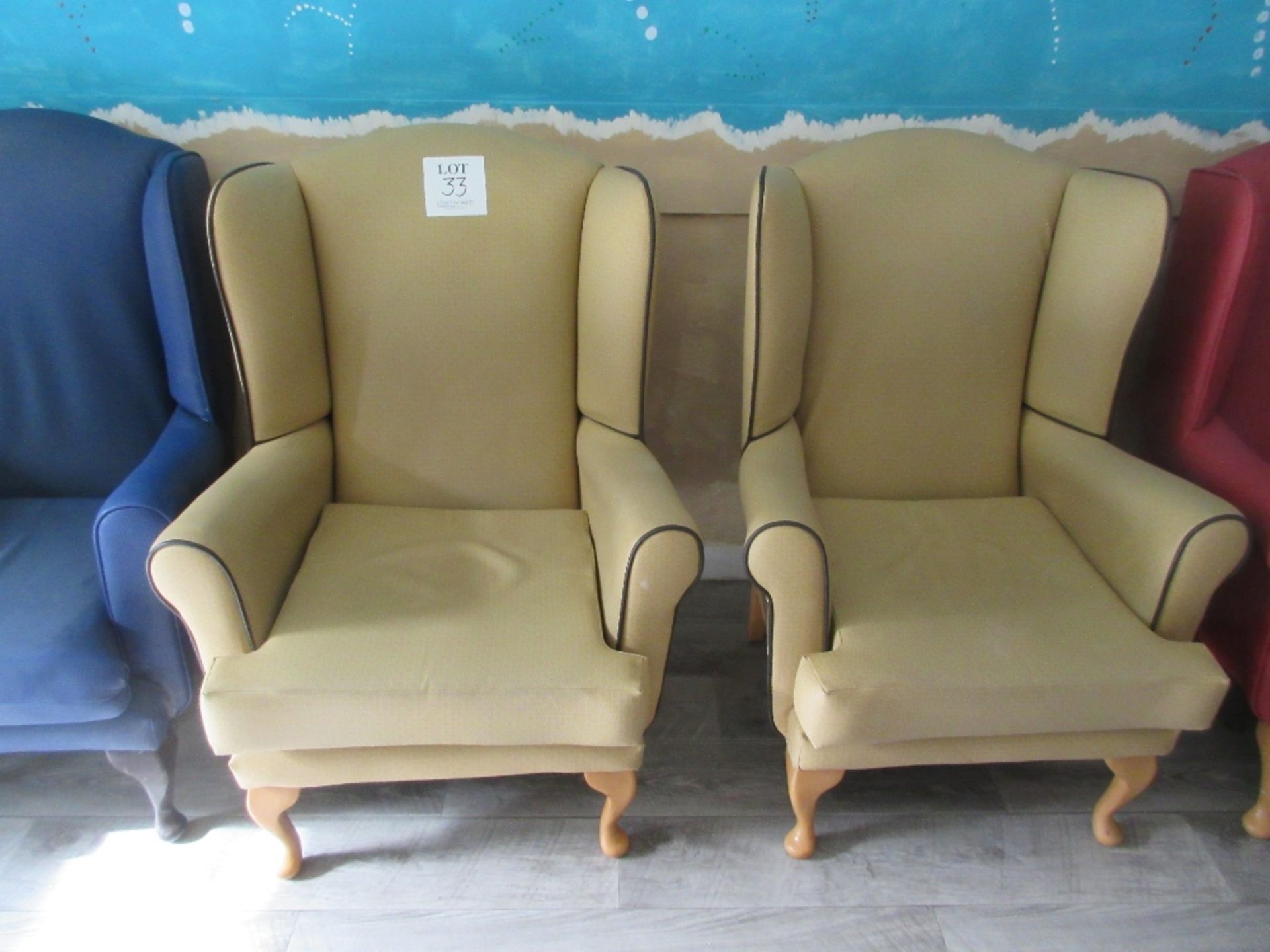 3 - Brown vinyl based armchairs