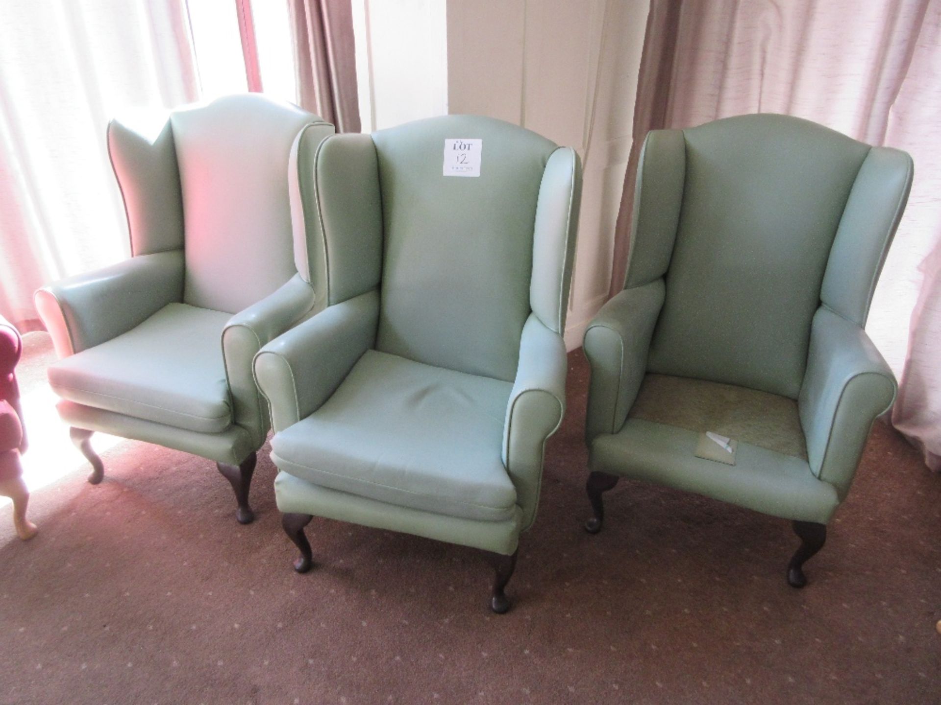 4 - Green vinyl based armchairs