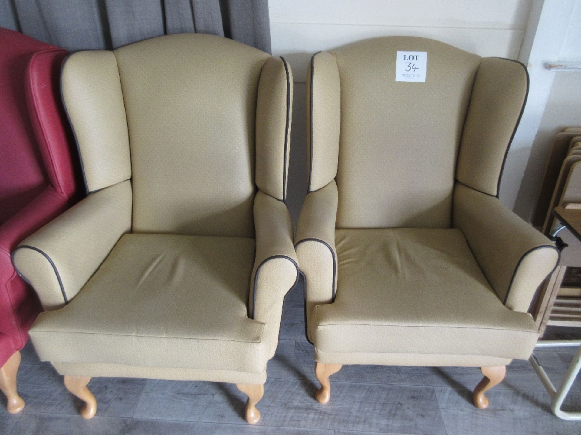 2 - Brown vinyl based armchairs and 1 green