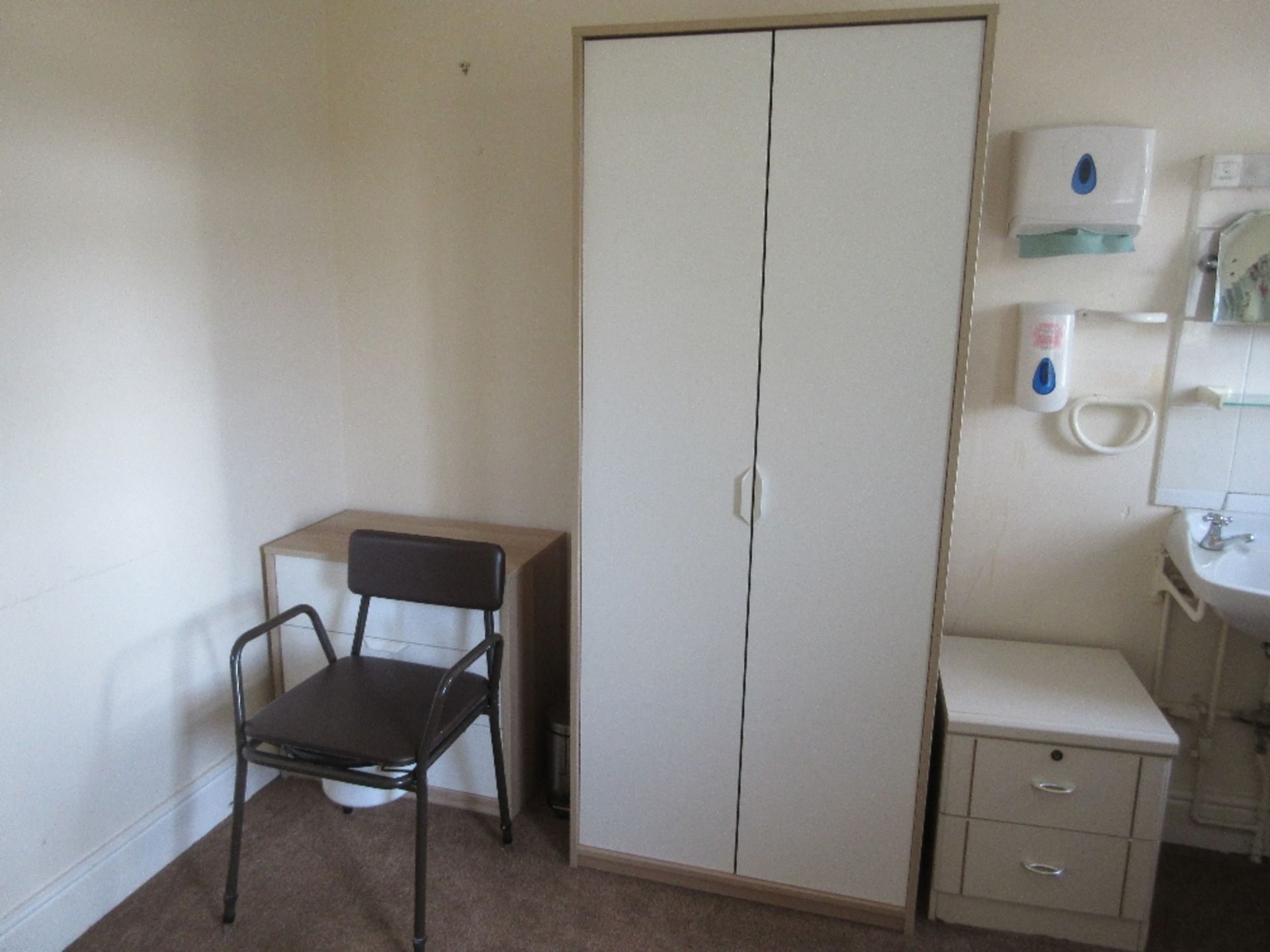 Contents of Room 7 to include: high back chair, commode, height adjusting table, wardrobe, three