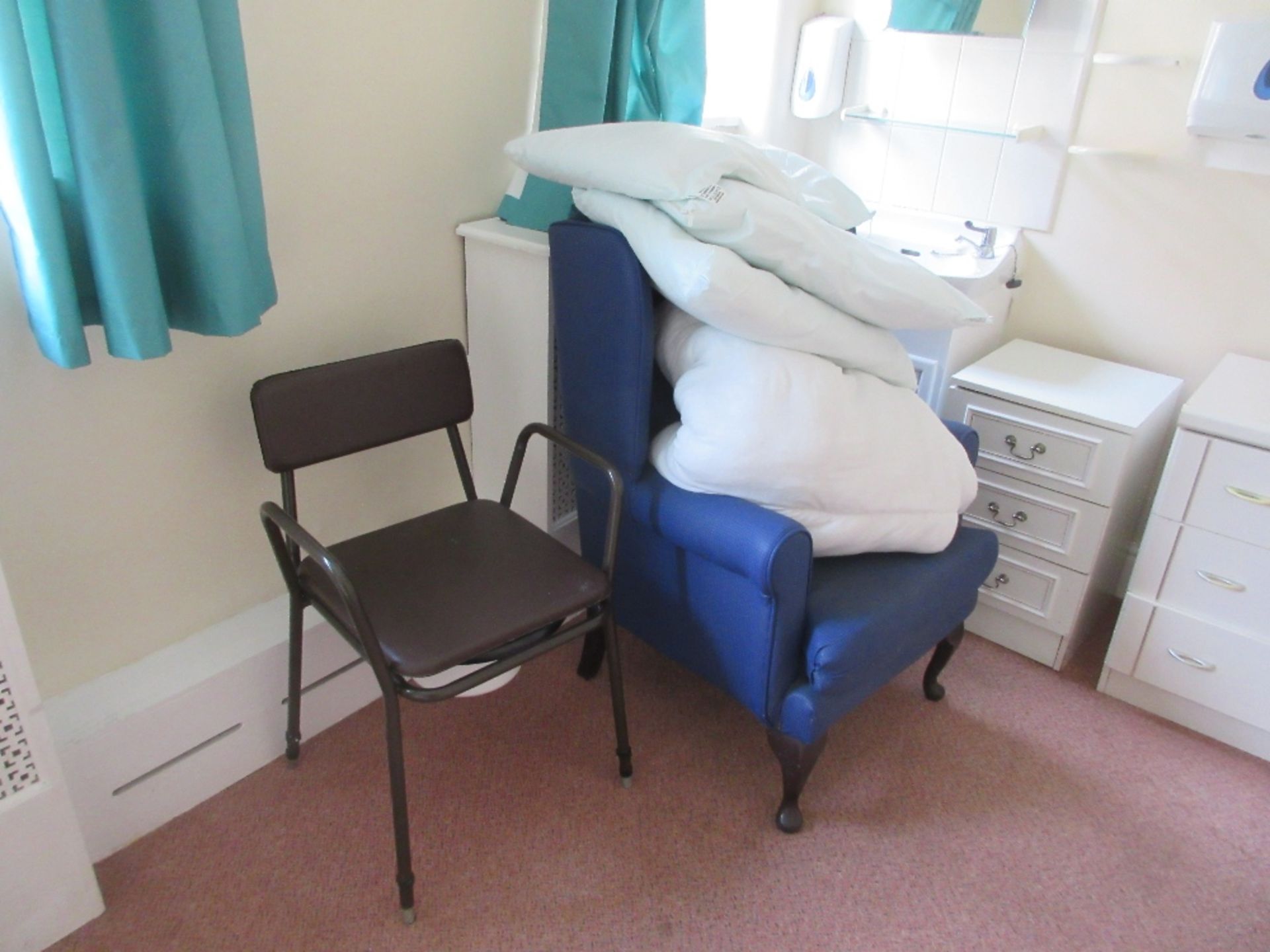 Contents of Room 8 to include: wardrobe, three drawer bedside cabinet, chair, sensor mat, commode