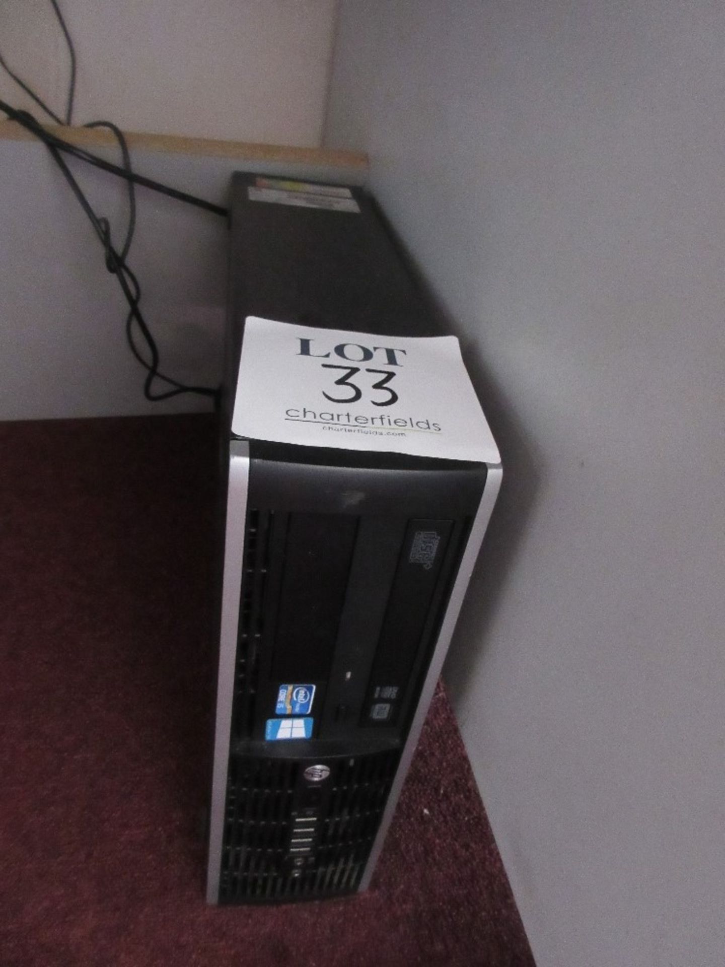 Hewlett Packard mini tower PC with flat screen monitor, keyboard and mouse incorporating I5-2400 Pro