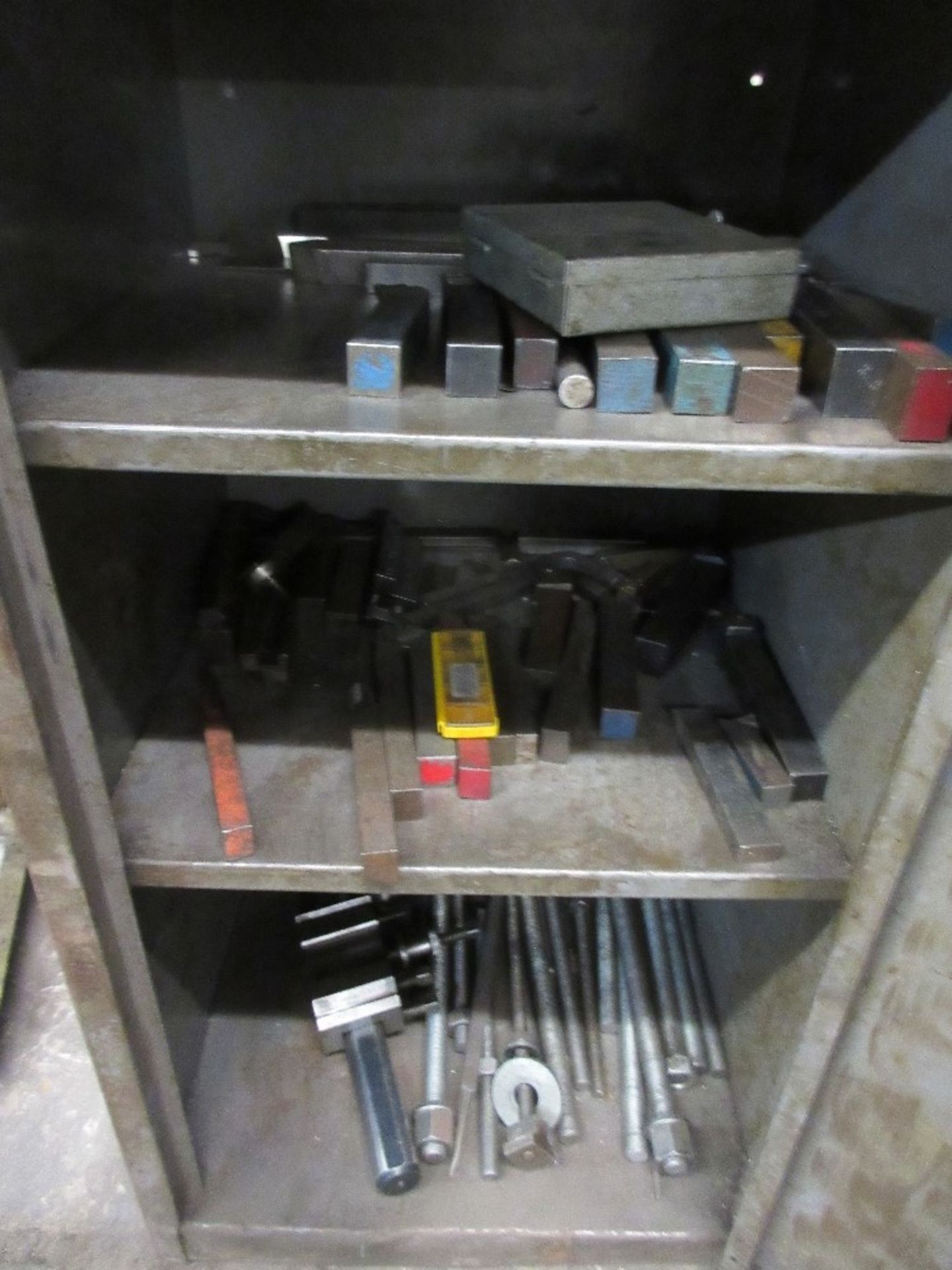 Cupboard containing lathe cutting tools