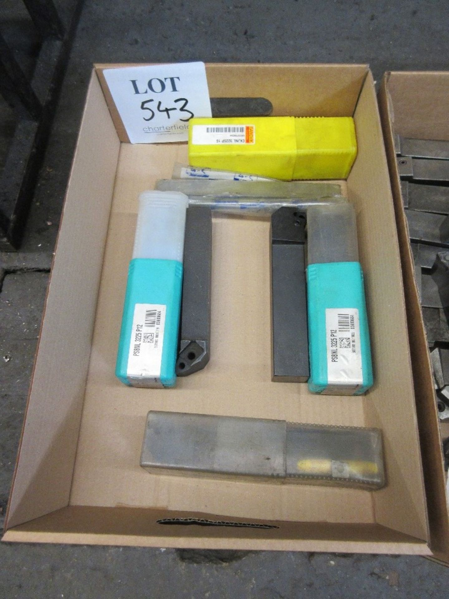 Box of various lathe cutting tools